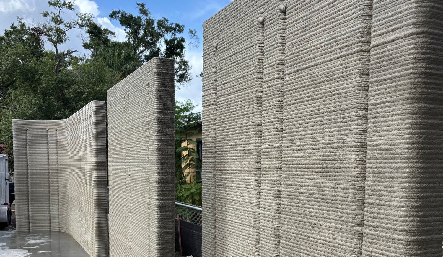 Masonry walls printed in place on a residential slab