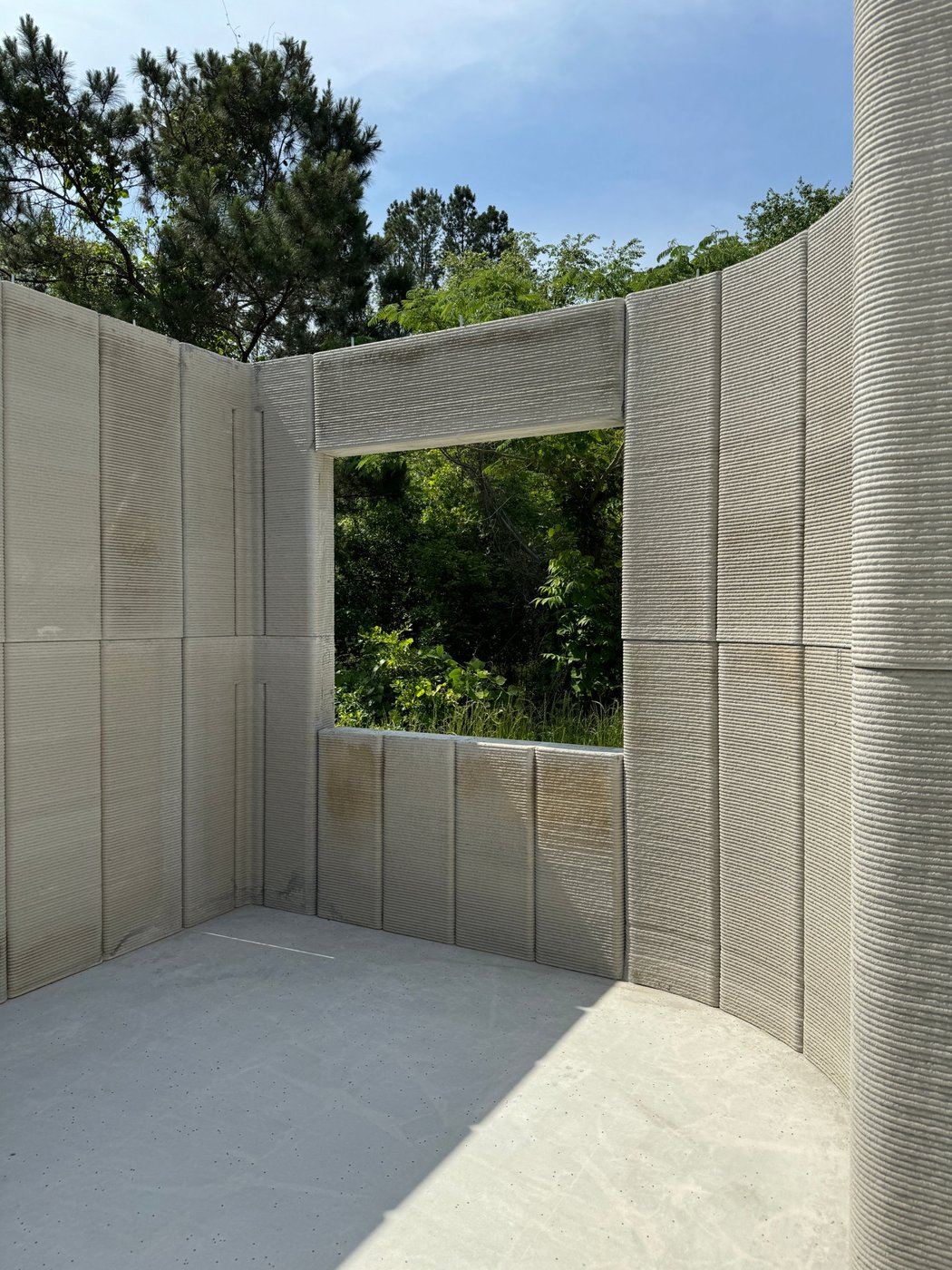 Printed masonry wall assembly with a window opening and lintel